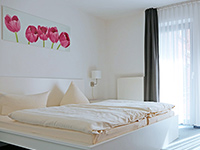 Schlafzimmer: Moderne Ferienwohnung Klink Müritz